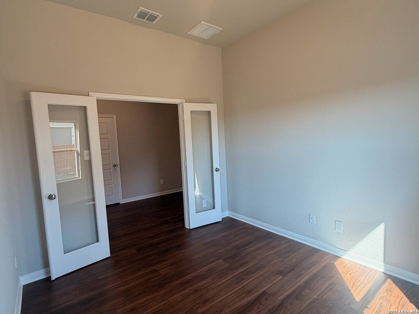 20929 Pleasanton Road San Antonio, TX 78264 - Photo 42 of 51 an empty room with wooden floor and closet