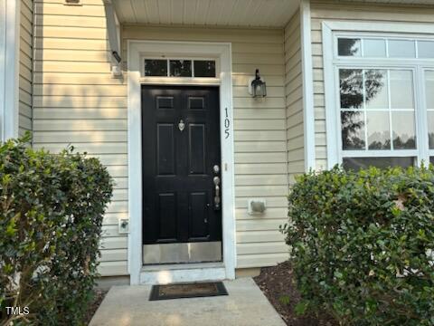 1311 Canyon Rock Court, Unit 105 Raleigh, NC 27610 - Photo 2 of 11 a view of entrance door of the house