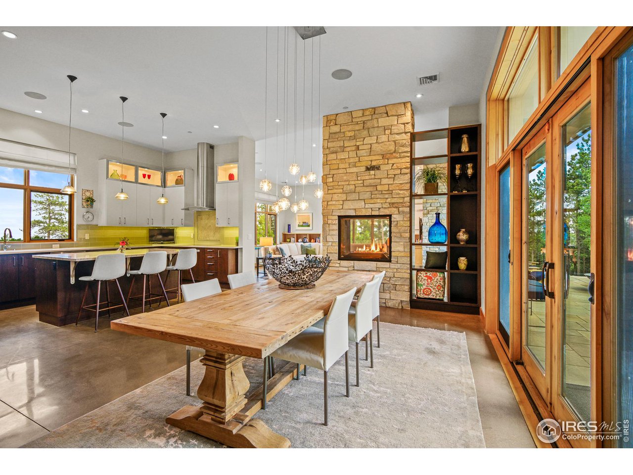 575 Reed Ranch Road Boulder, CO 80302 - Photo 14 of 40 a view of a dining room with furniture