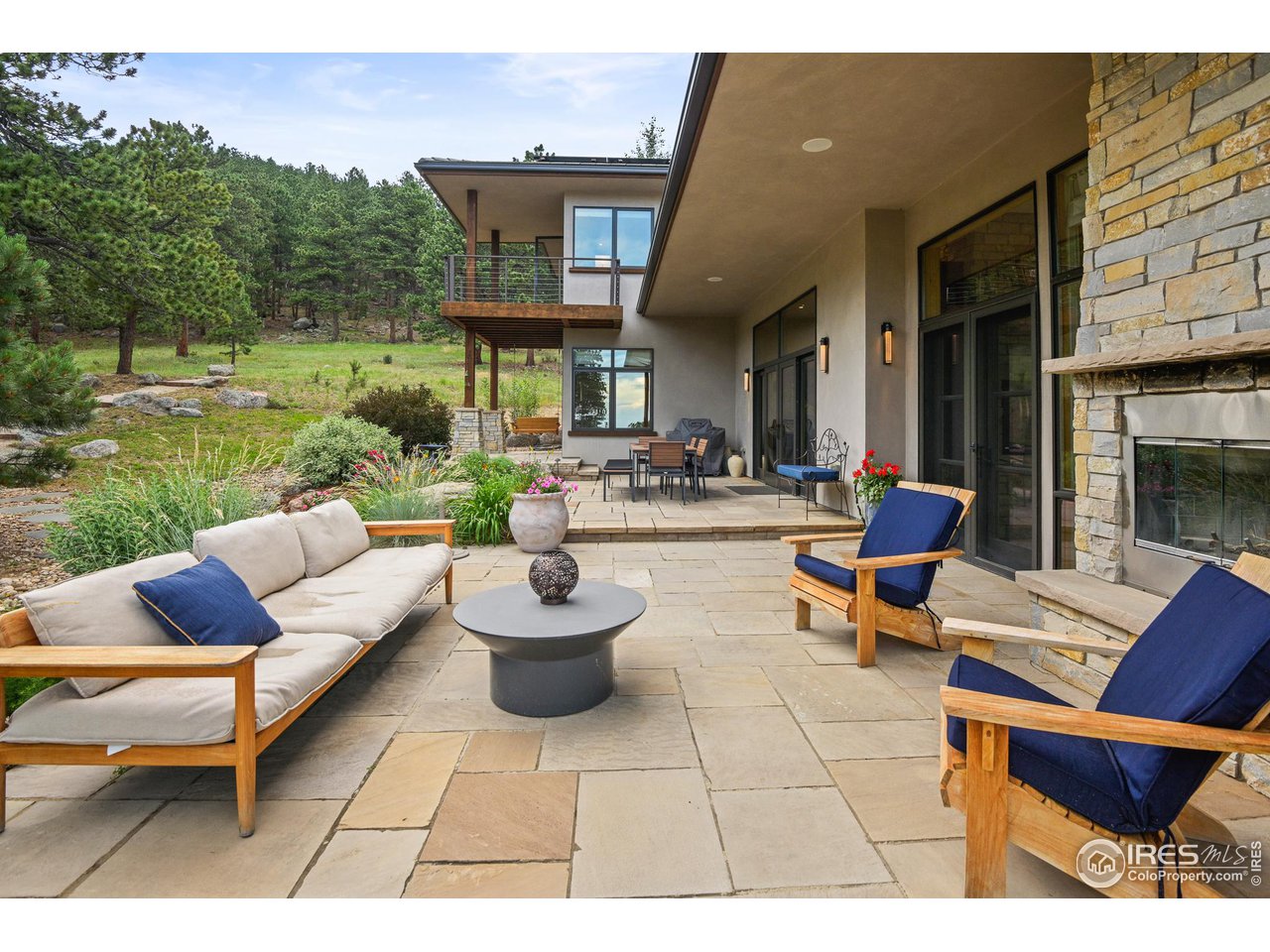 575 Reed Ranch Road Boulder, CO 80302 - Photo 16 of 40 a outdoor space with patio furniture and a patio