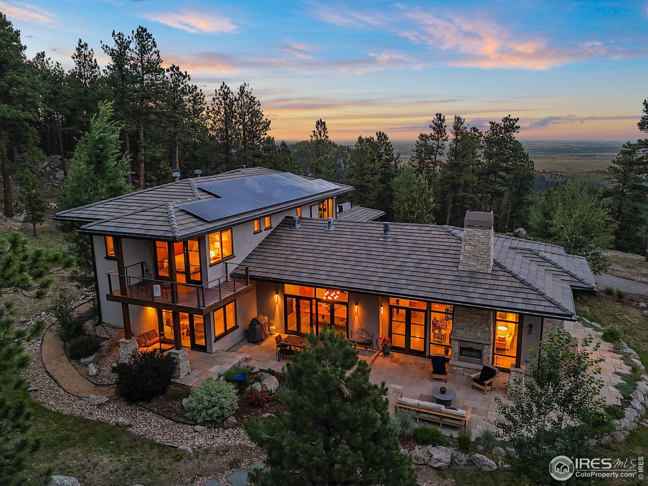 575 Reed Ranch Road Boulder, CO 80302 - Photo 32 of 40 an aerial view of a house with swimming pool a yard and mountain view in back