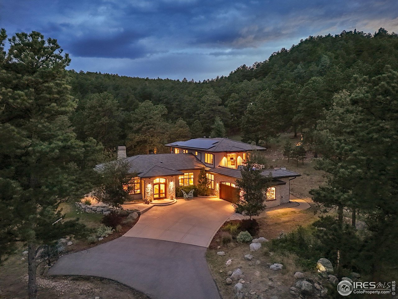 575 Reed Ranch Road Boulder, CO 80302 - Photo 35 of 40 a front view of a house with a yard