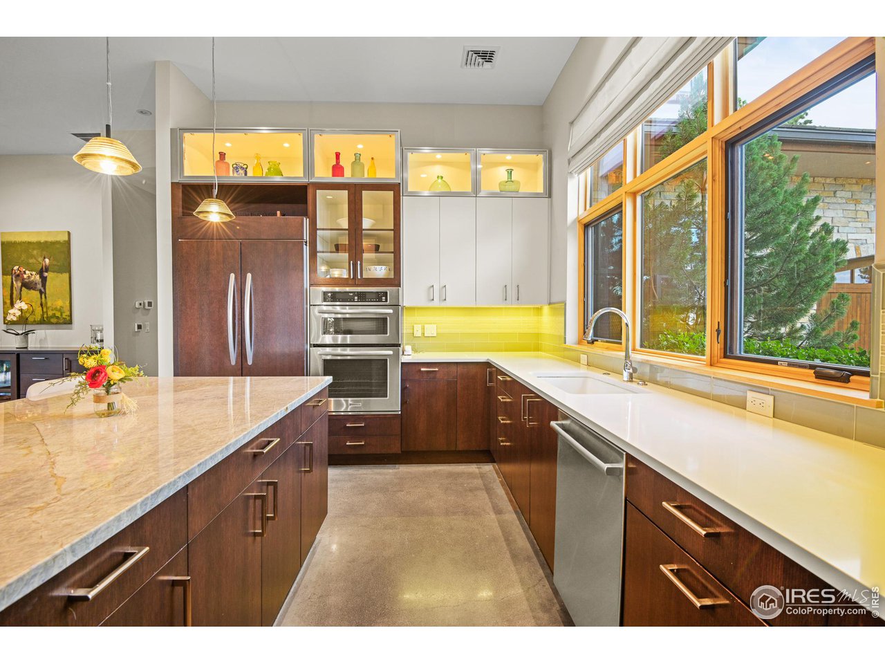 575 Reed Ranch Road Boulder, CO 80302 - Photo 8 of 40 a kitchen with a sink and large windows