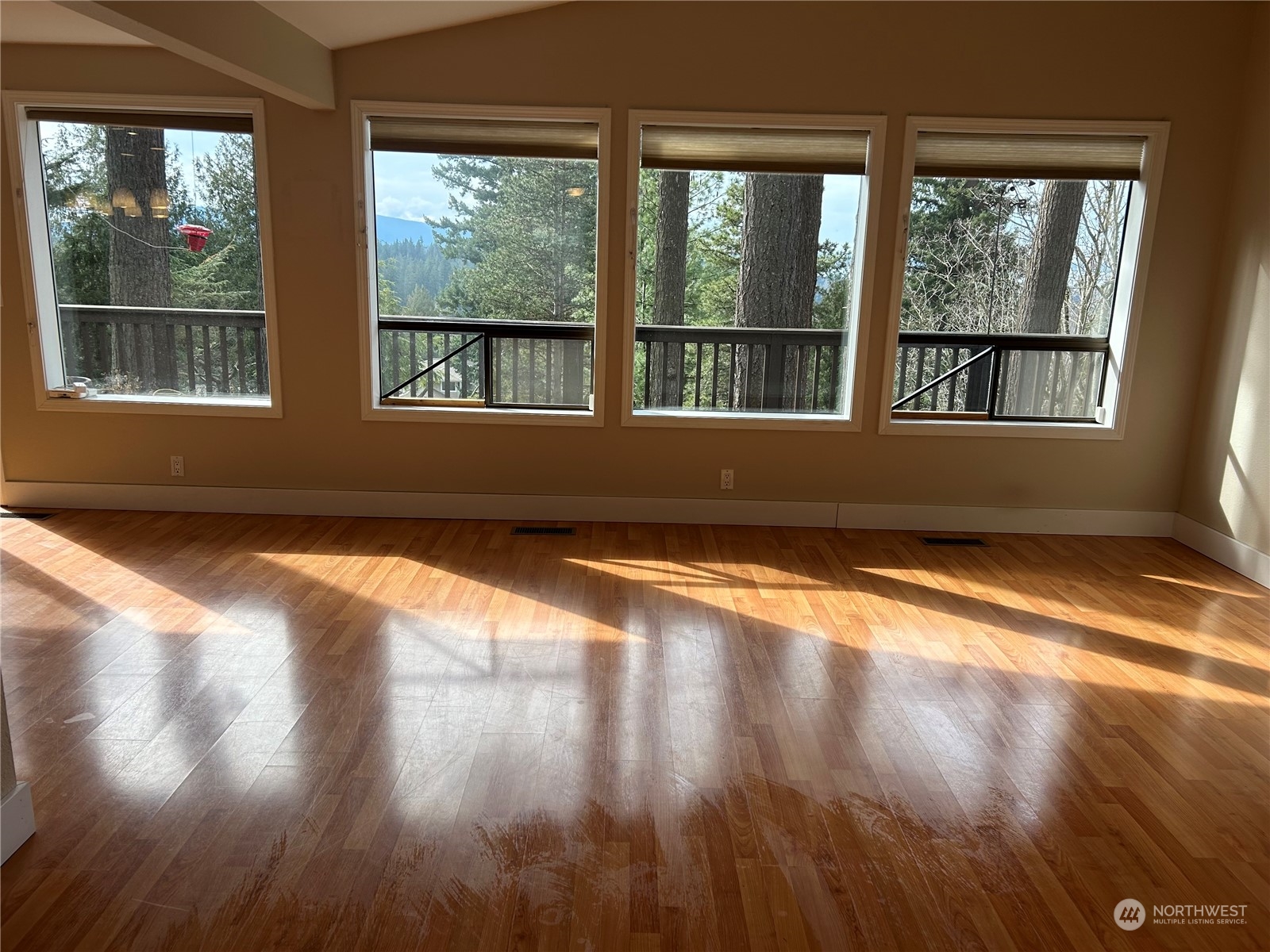 2106 37th Street Bellingham, WA 98229 - Photo 14 of 32 a view of empty room with wooden floor and fan