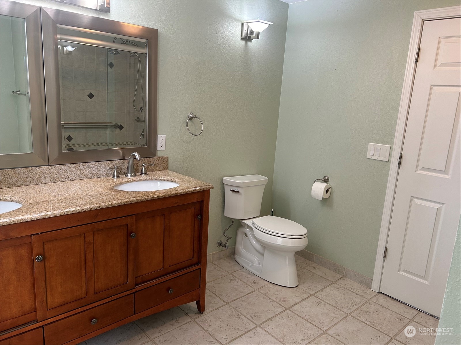 2106 37th Street Bellingham, WA 98229 - Photo 17 of 32 a bathroom with a sink and a toilet
