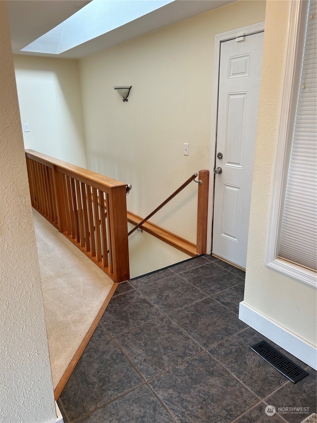 2106 37th Street Bellingham, WA 98229 - Photo 24 of 32 a view of a hallway with staircase