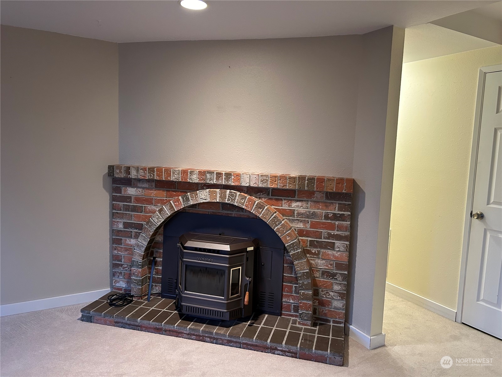 2106 37th Street Bellingham, WA 98229 - Photo 26 of 32 a close view of a fireplace in the room