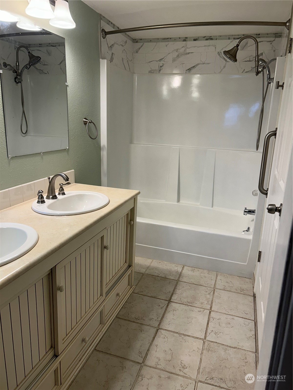 2106 37th Street Bellingham, WA 98229 - Photo 32 of 32 a bathroom with a sink and a mirror