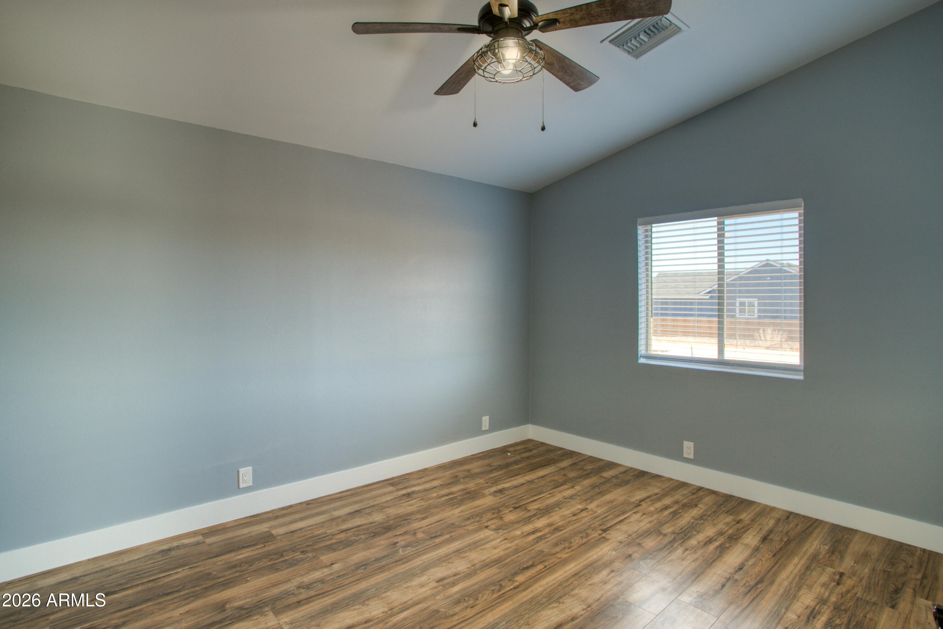 97 Mulligan Road Eagar, AZ 85925 - Photo 15 of 27 an empty room with a window
