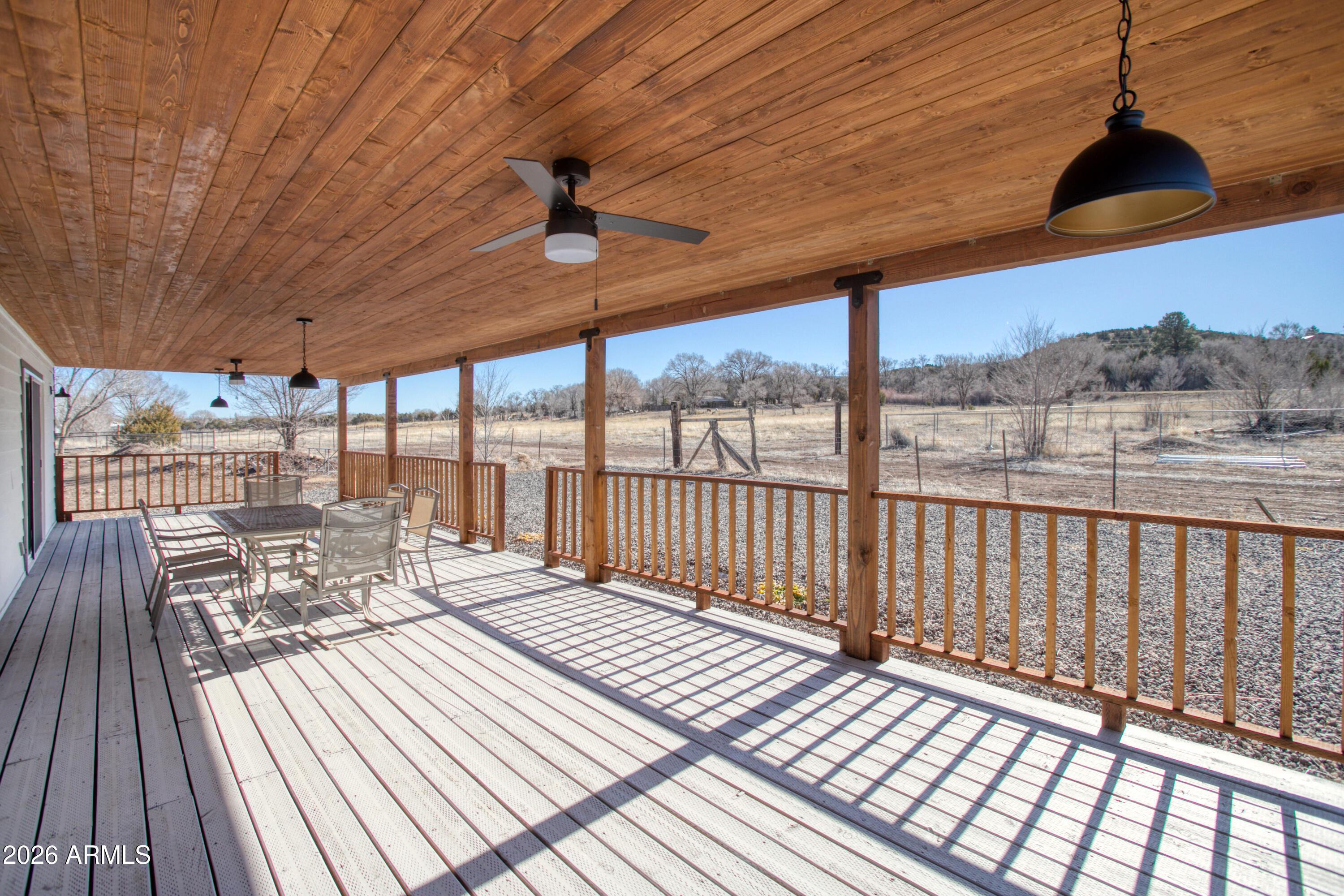 97 Mulligan Road Eagar, AZ 85925 - Photo 18 of 27 a view of balcony with wooden floor