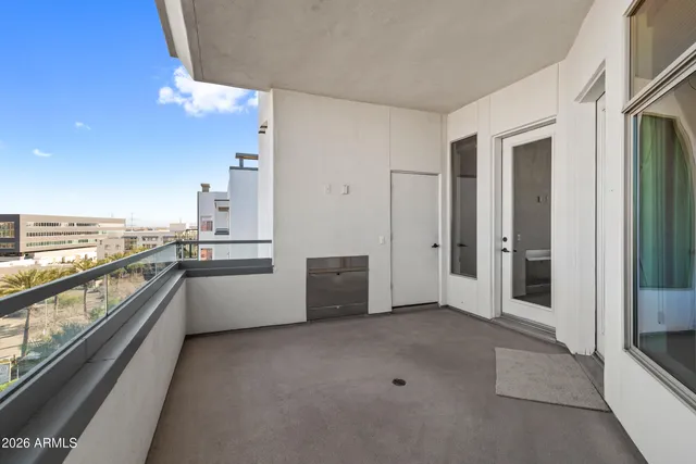 a view of a kitchen with a sink and an oven