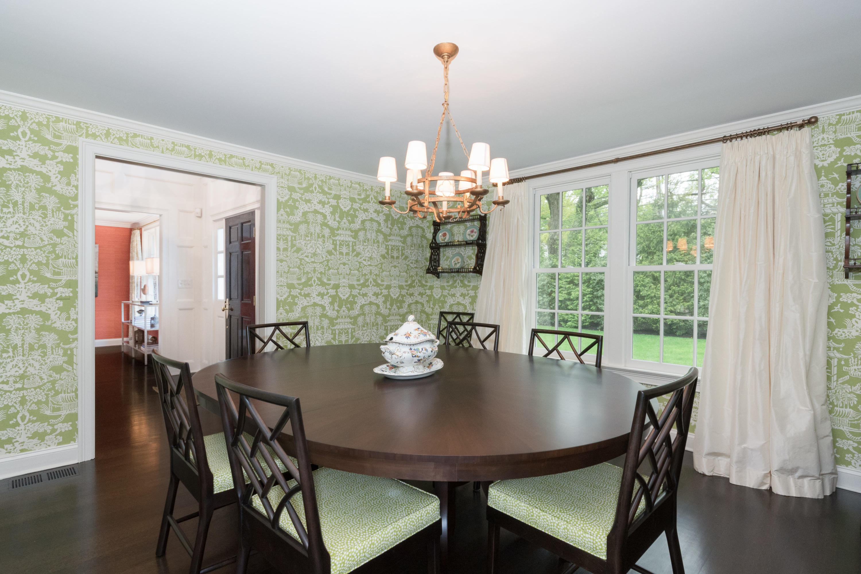 280 Hollow Tree Ridge Road Darien, CT 06820 - Photo 11 of 66 a view of a dining room with furniture and chandelier