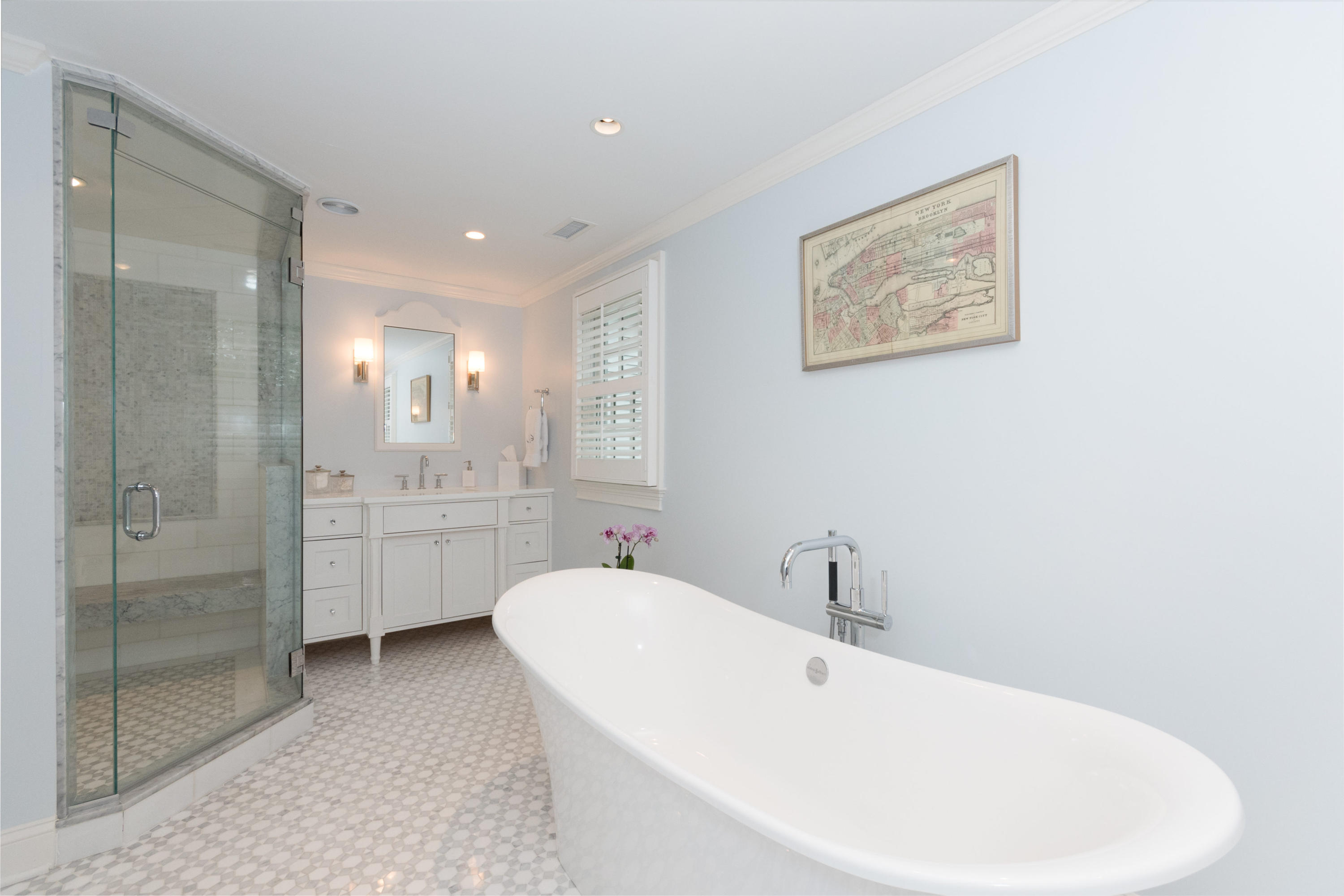 280 Hollow Tree Ridge Road Darien, CT 06820 - Photo 36 of 66 a bathroom with a white tub sink shower and mirror
