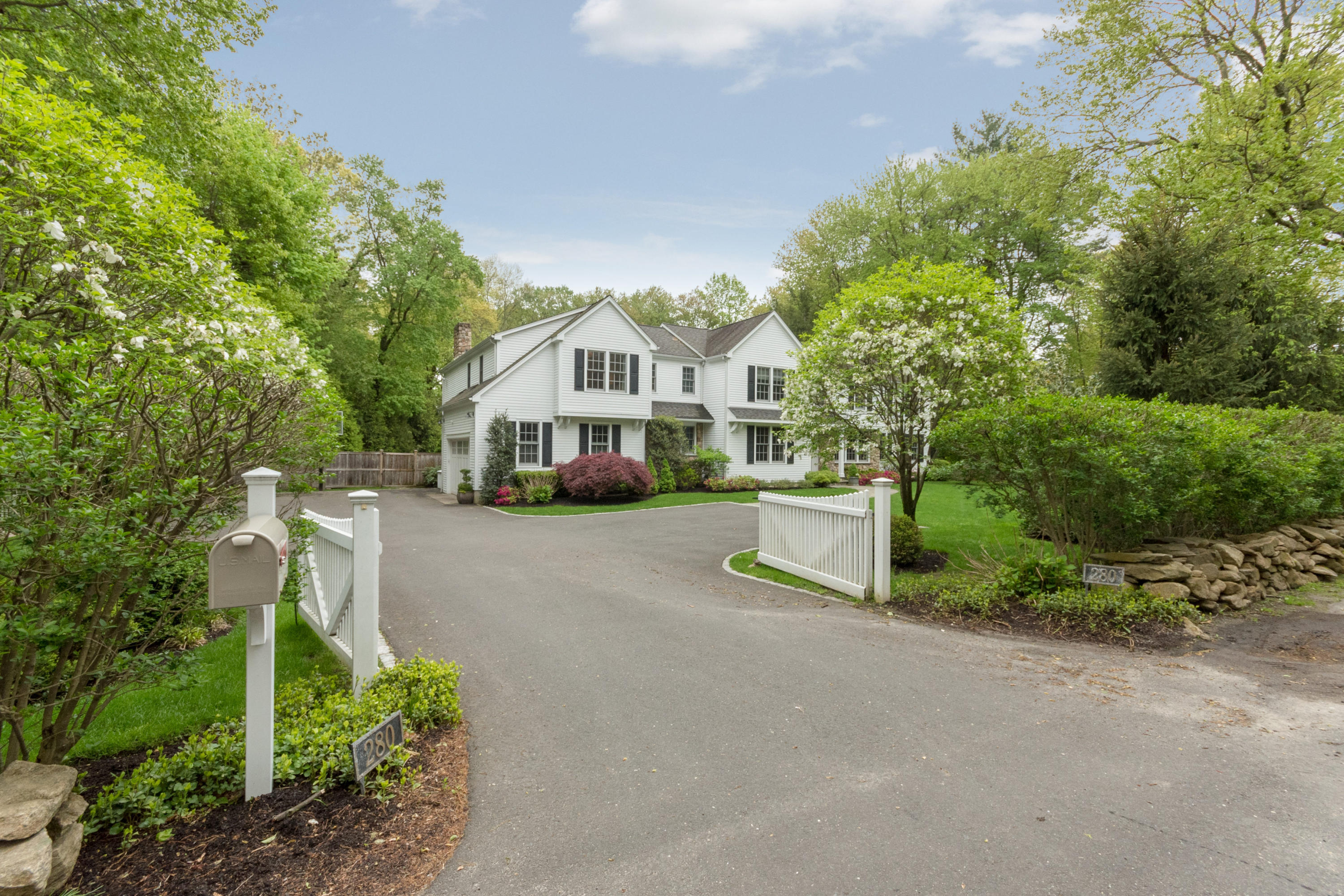 280 Hollow Tree Ridge Road Darien, CT 06820 - Photo 4 of 66 a bus parked in front of a house