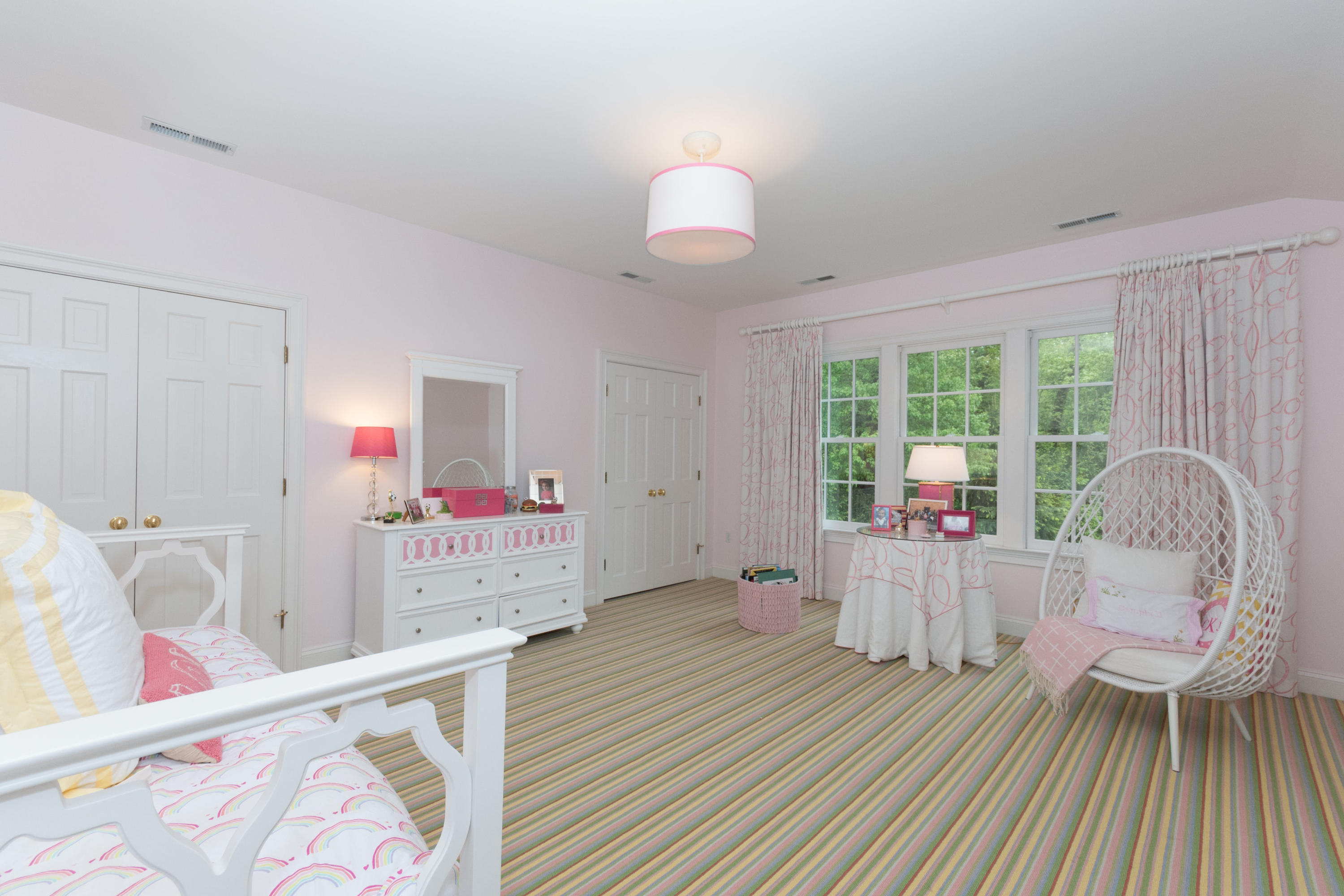 280 Hollow Tree Ridge Road Darien, CT 06820 - Photo 46 of 66 a bedroom with furniture and a wooden floor