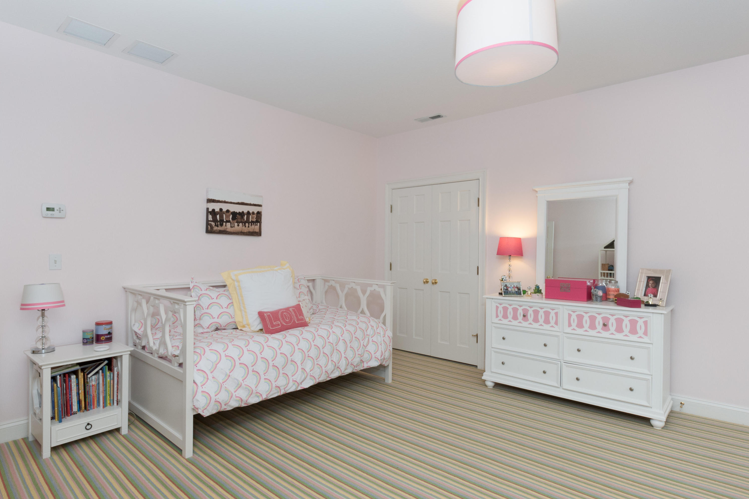 280 Hollow Tree Ridge Road Darien, CT 06820 - Photo 47 of 66 a bedroom with a bed and a dresser