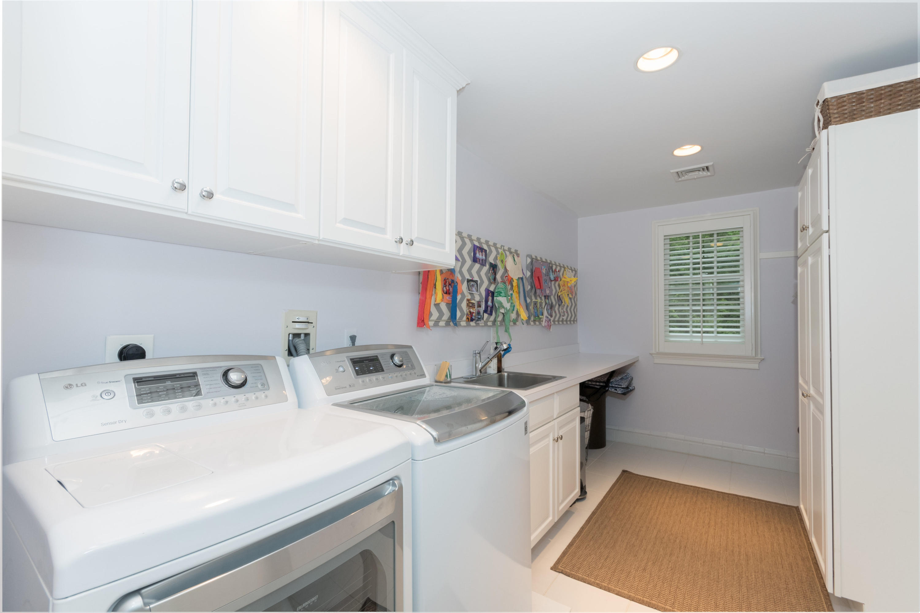 280 Hollow Tree Ridge Road Darien, CT 06820 - Photo 50 of 66 a kitchen with a sink and cabinets
