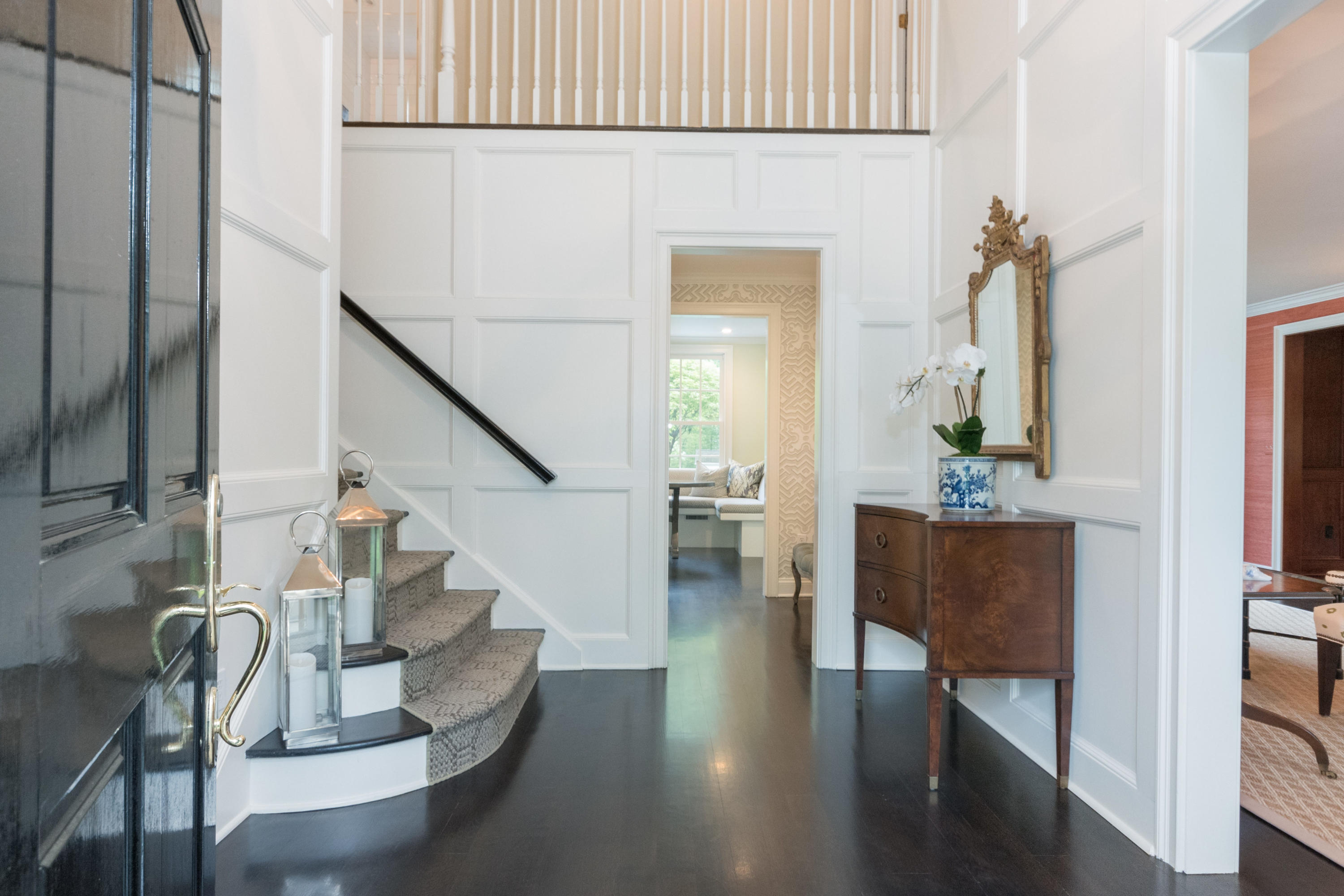 280 Hollow Tree Ridge Road Darien, CT 06820 - Photo 6 of 66 a view of entryway and hall with wooden floor