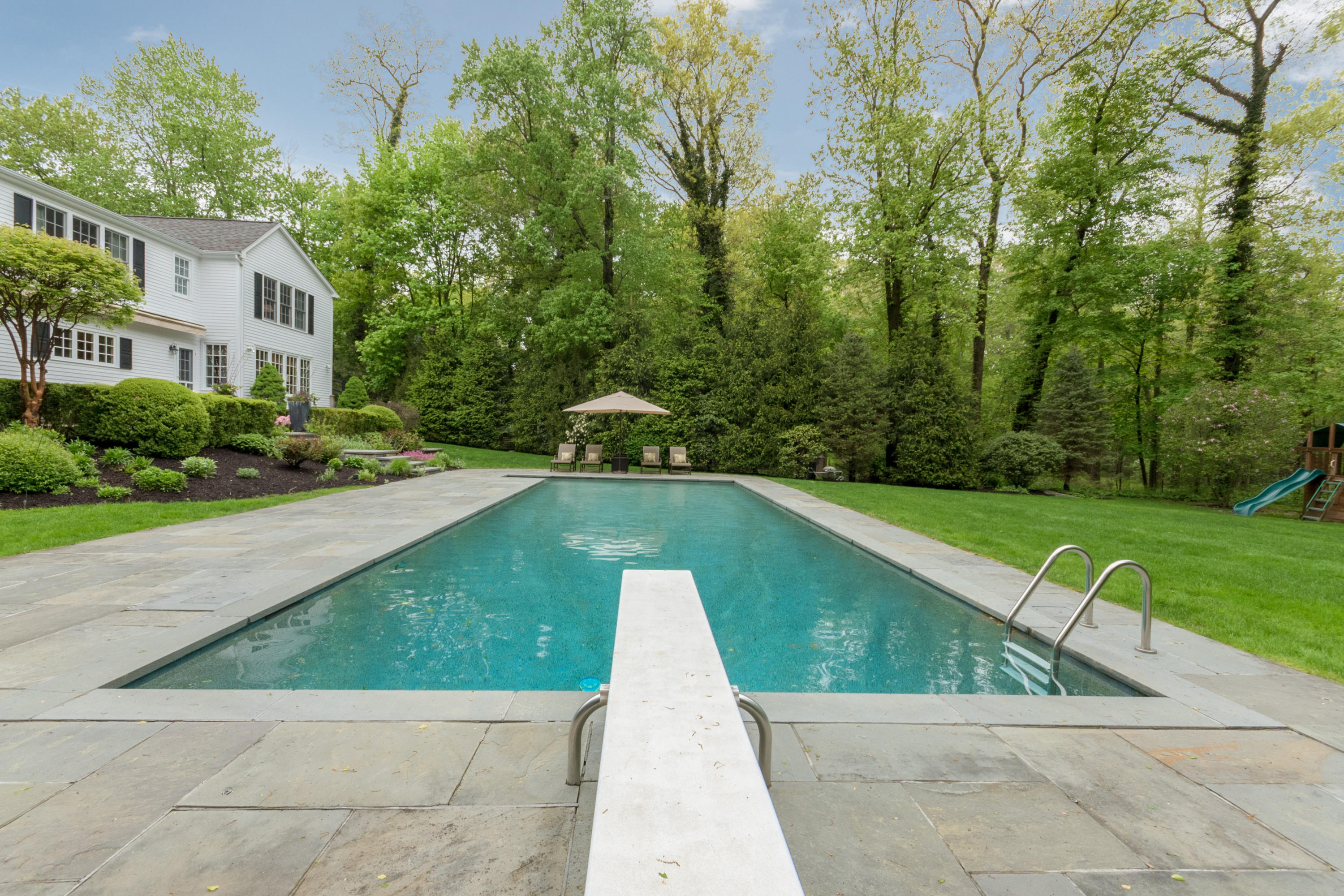 280 Hollow Tree Ridge Road Darien, CT 06820 - Photo 63 of 66 a view of outdoor space yard deck and swimming pool