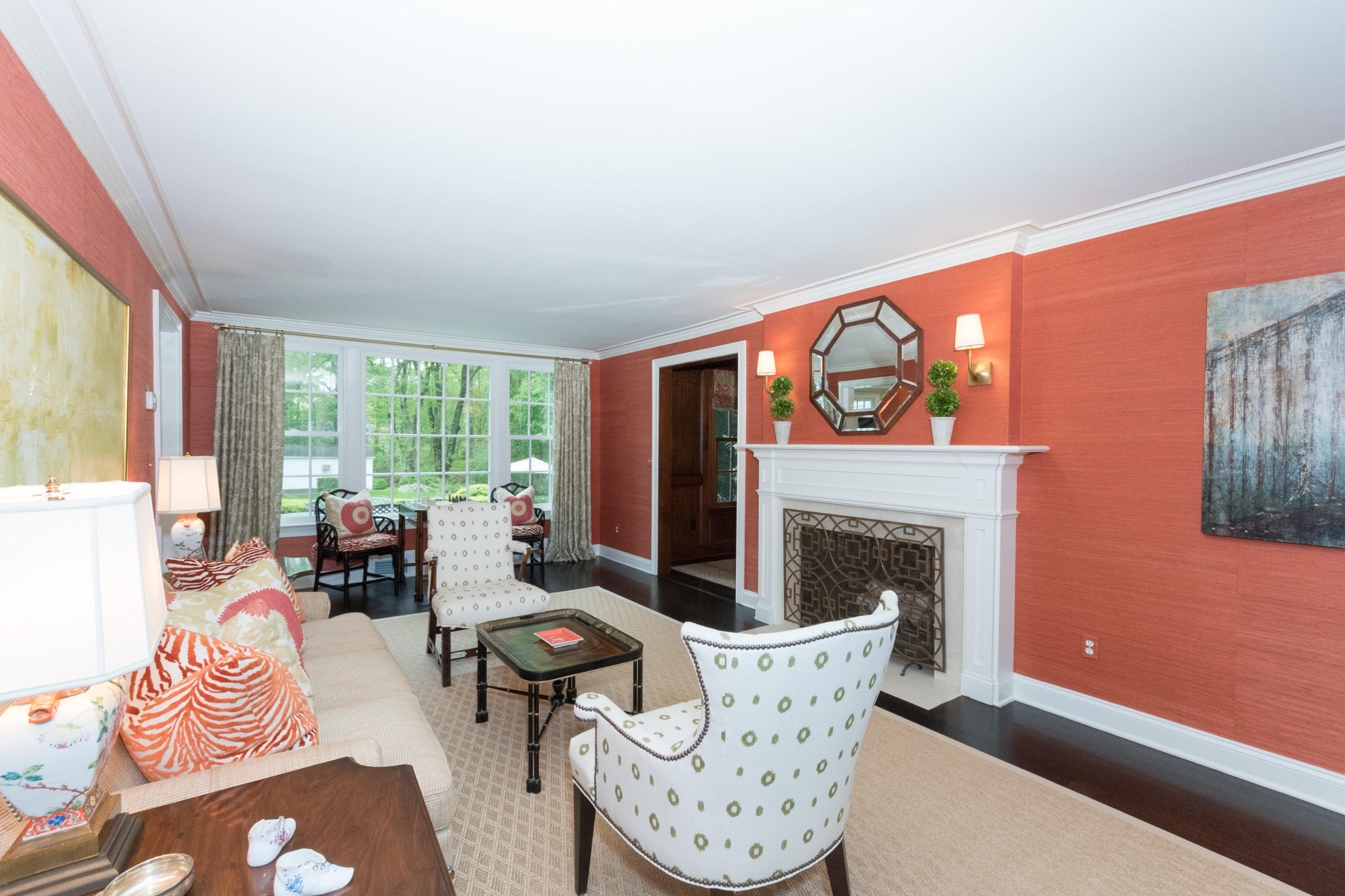 280 Hollow Tree Ridge Road Darien, CT 06820 - Photo 9 of 66 a living room with fireplace furniture and a large window