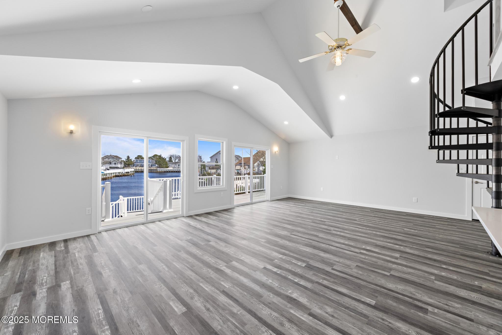 157 Rodman Drive Beach Haven West, NJ 08050 - Photo 12 of 44 wooden floor in an empty room with a window
