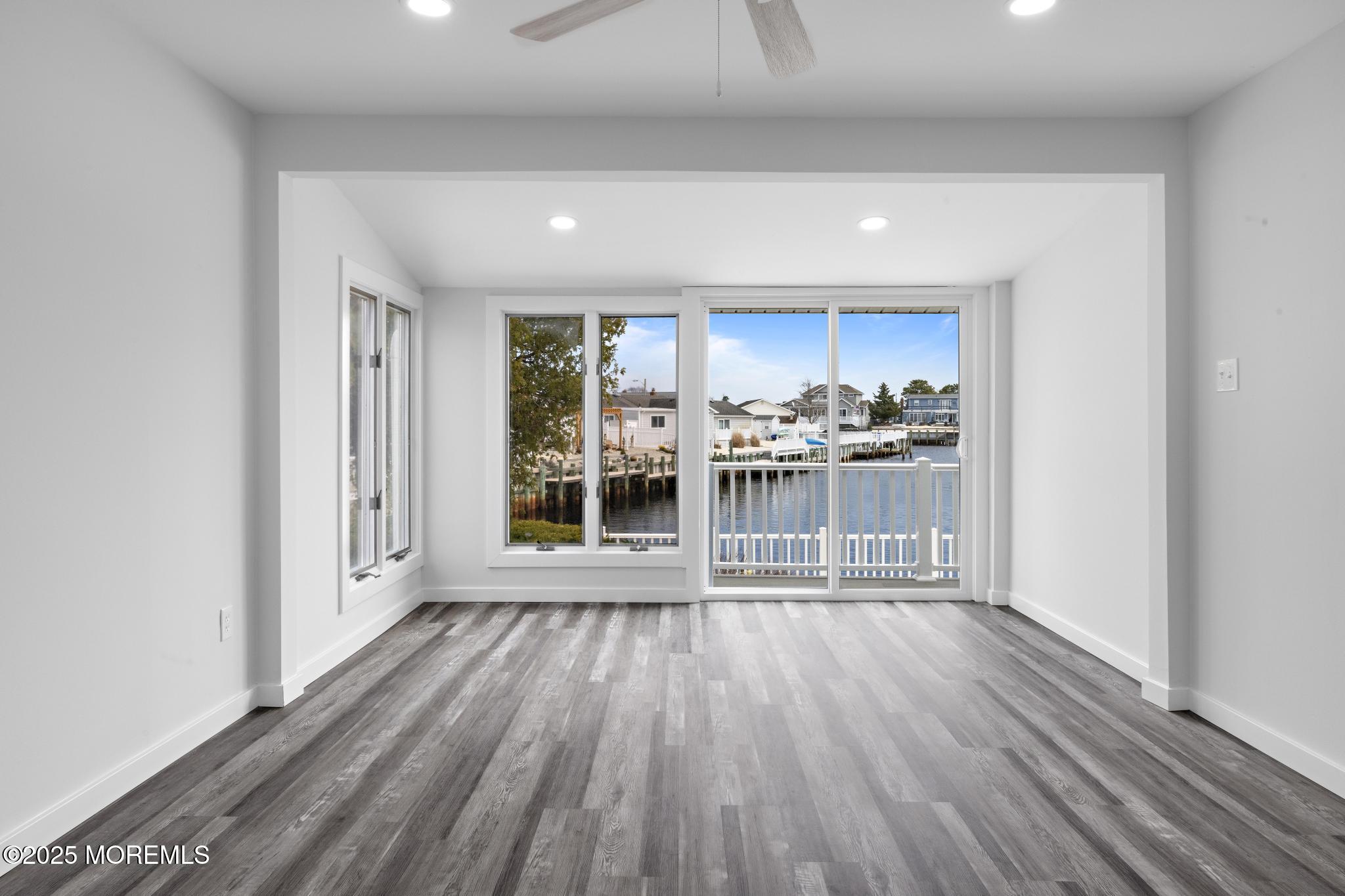 157 Rodman Drive Beach Haven West, NJ 08050 - Photo 16 of 44 a view of wooden floor and a window in a room