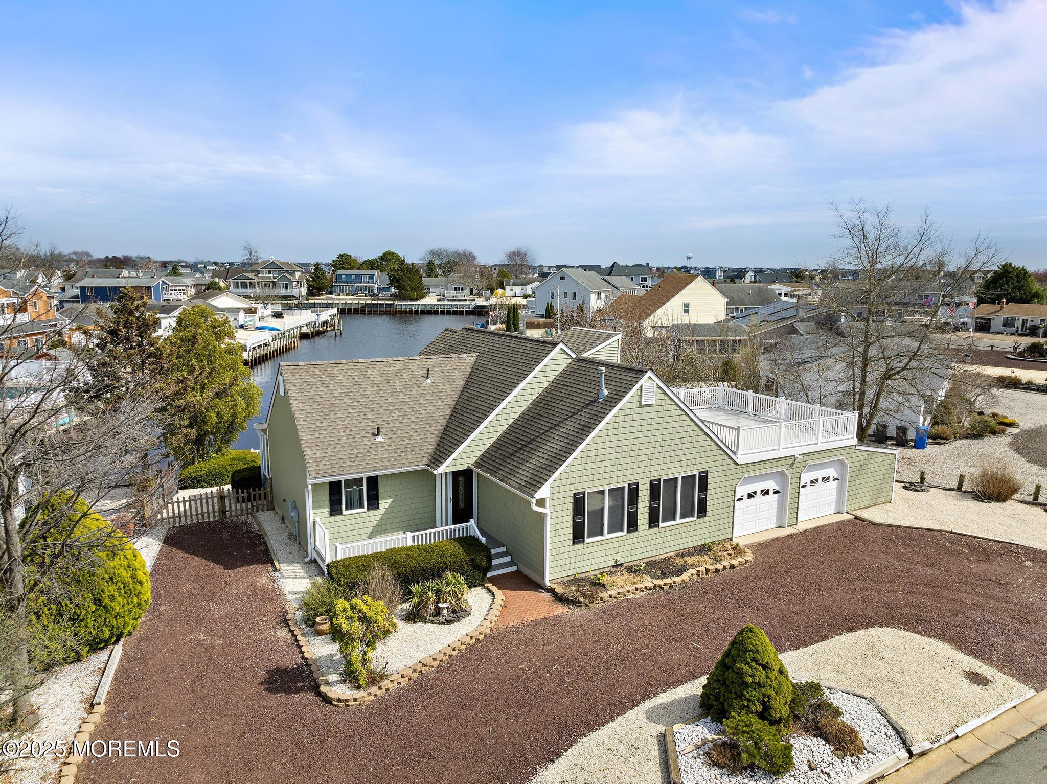 157 Rodman Drive Beach Haven West, NJ 08050 - Photo 2 of 44 an aerial view of a house with a ocean view