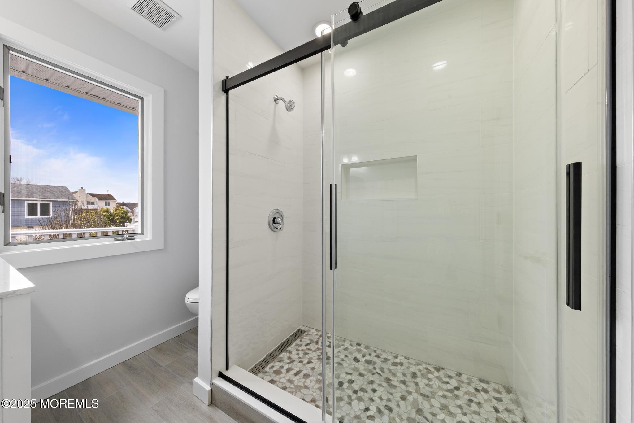 157 Rodman Drive Beach Haven West, NJ 08050 - Photo 26 of 44 a bathroom with a shower