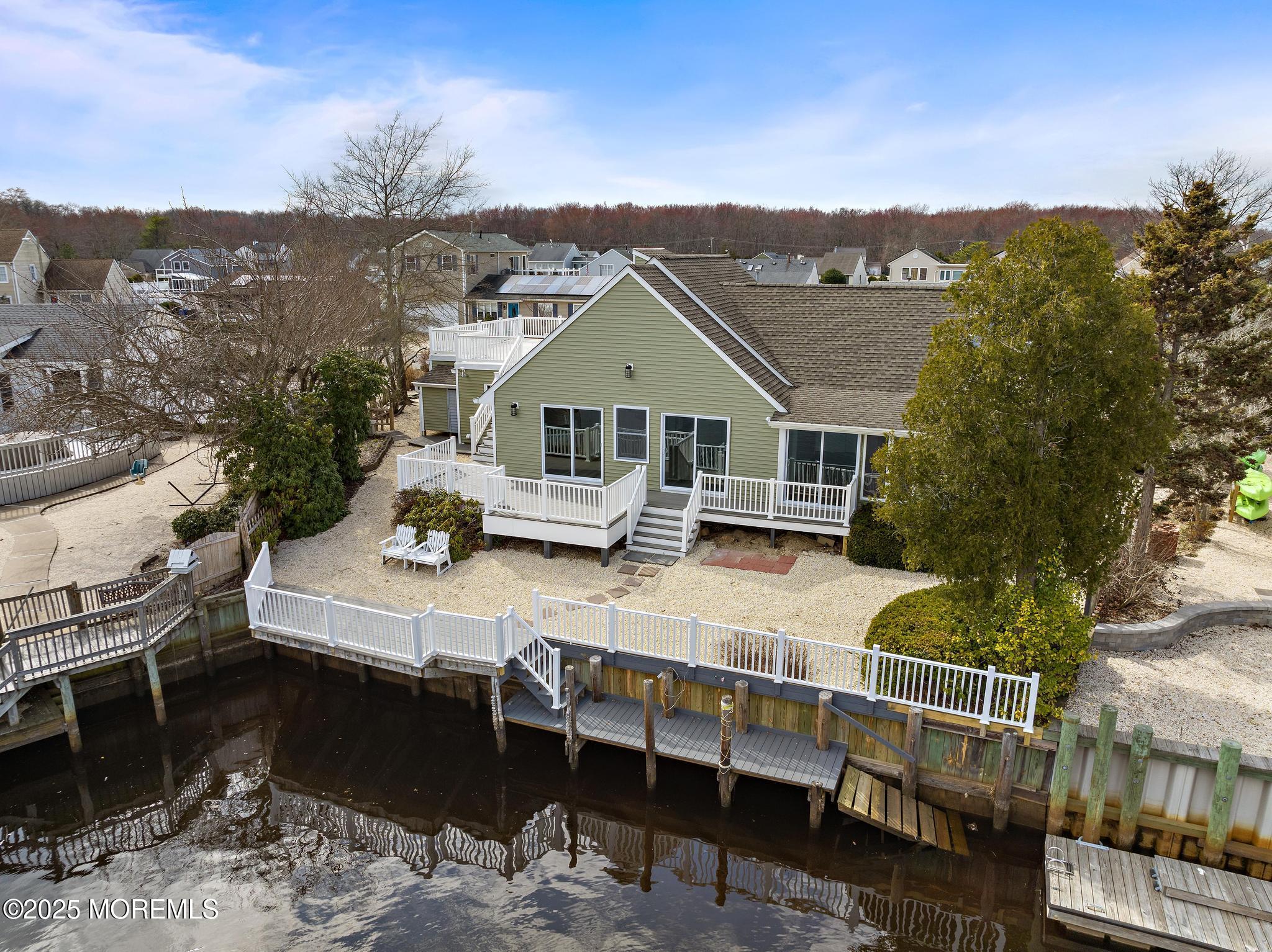 157 Rodman Drive Beach Haven West, NJ 08050 - Photo 32 of 44 a view of a house with a big yard