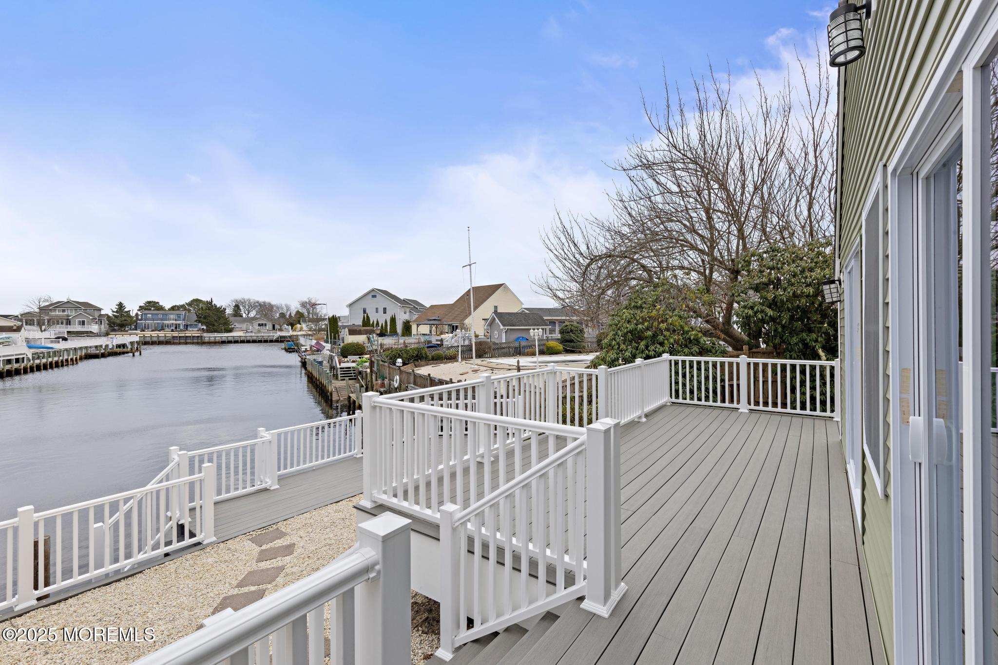 157 Rodman Drive Beach Haven West, NJ 08050 - Photo 35 of 44 a view of balcony with wooden floor and fence