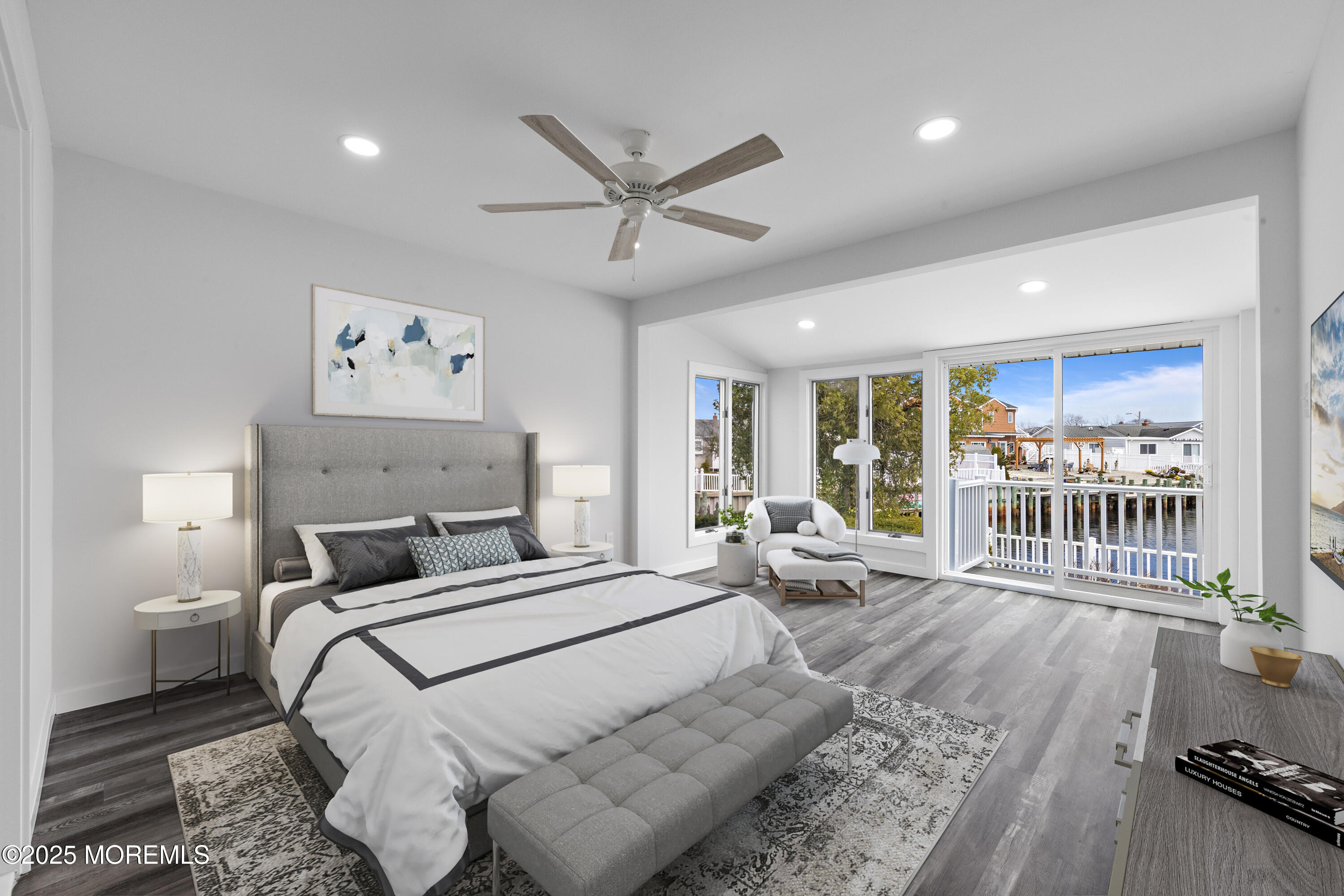 157 Rodman Drive Beach Haven West, NJ 08050 - Photo 6 of 44 a bedroom with a bed a large window and a rug