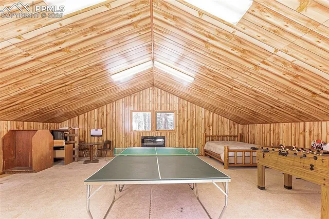 a view of swimming pool with outdoor seating