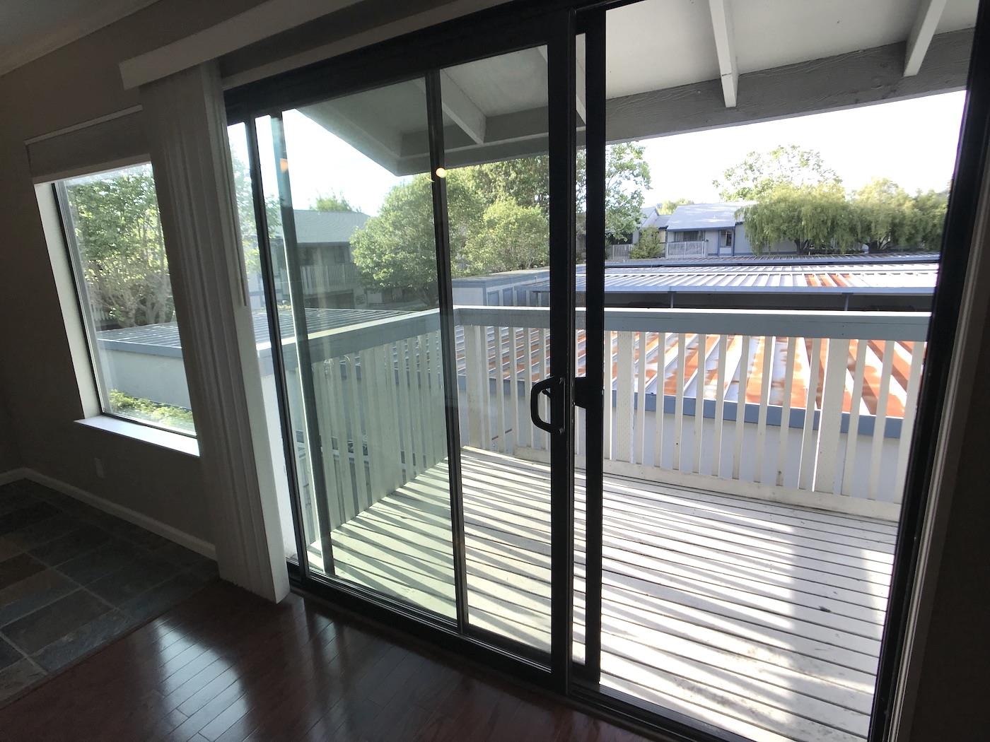 1925 46th Avenue, Unit 60 Capitola, CA 95010 - Photo 9 of 26 a view of a balcony with wooden floor
