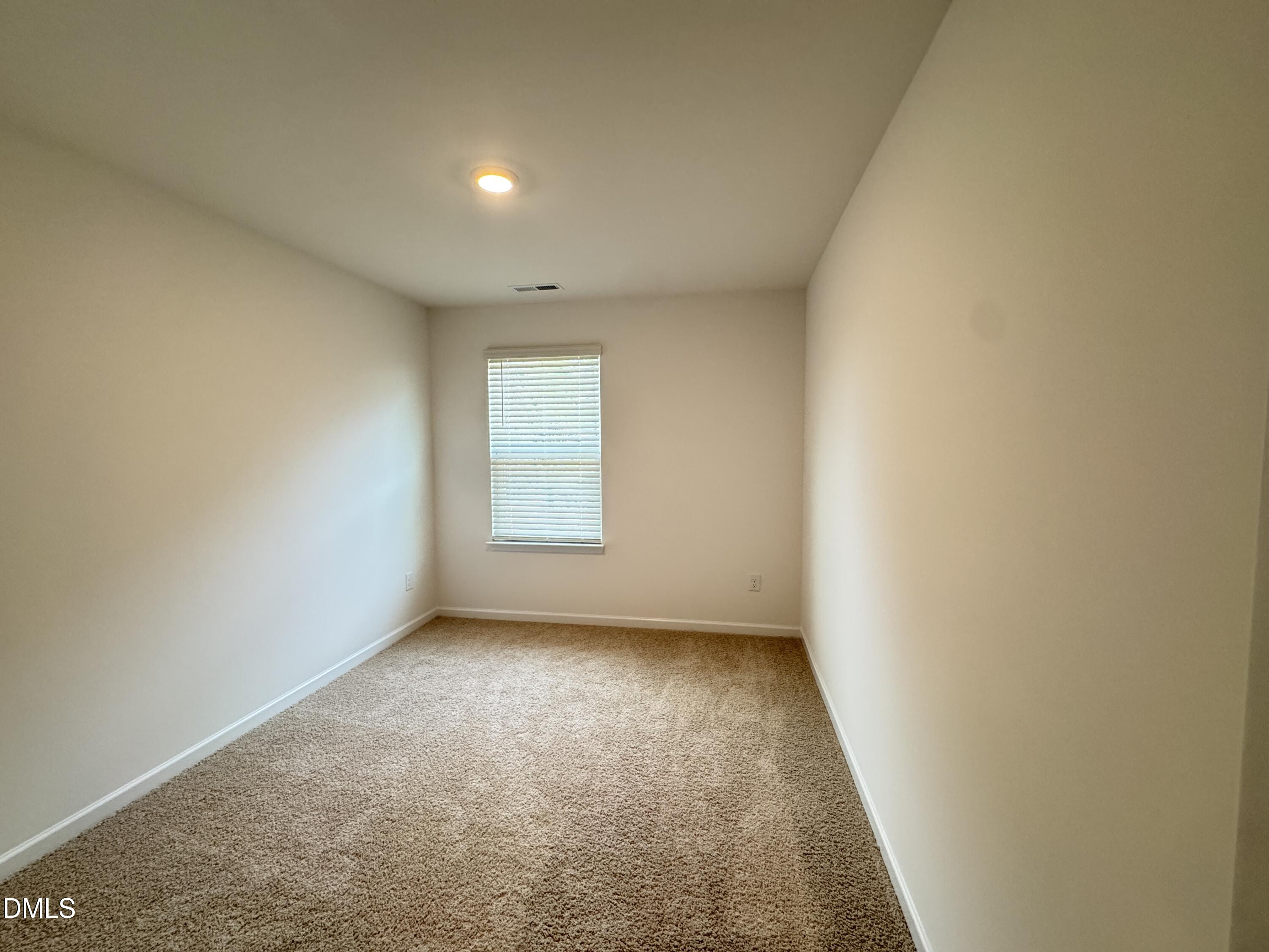 413 Belgian Red Way Wake Forest, NC 27587 - Photo 15 of 19 an empty room with a window