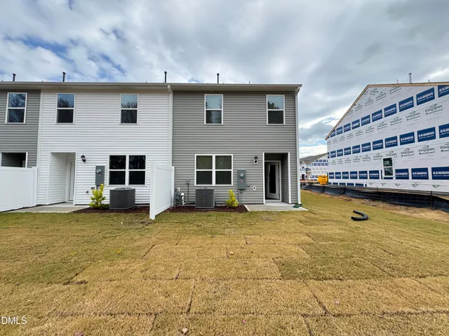 a view of swimming pool with outdoor seating
