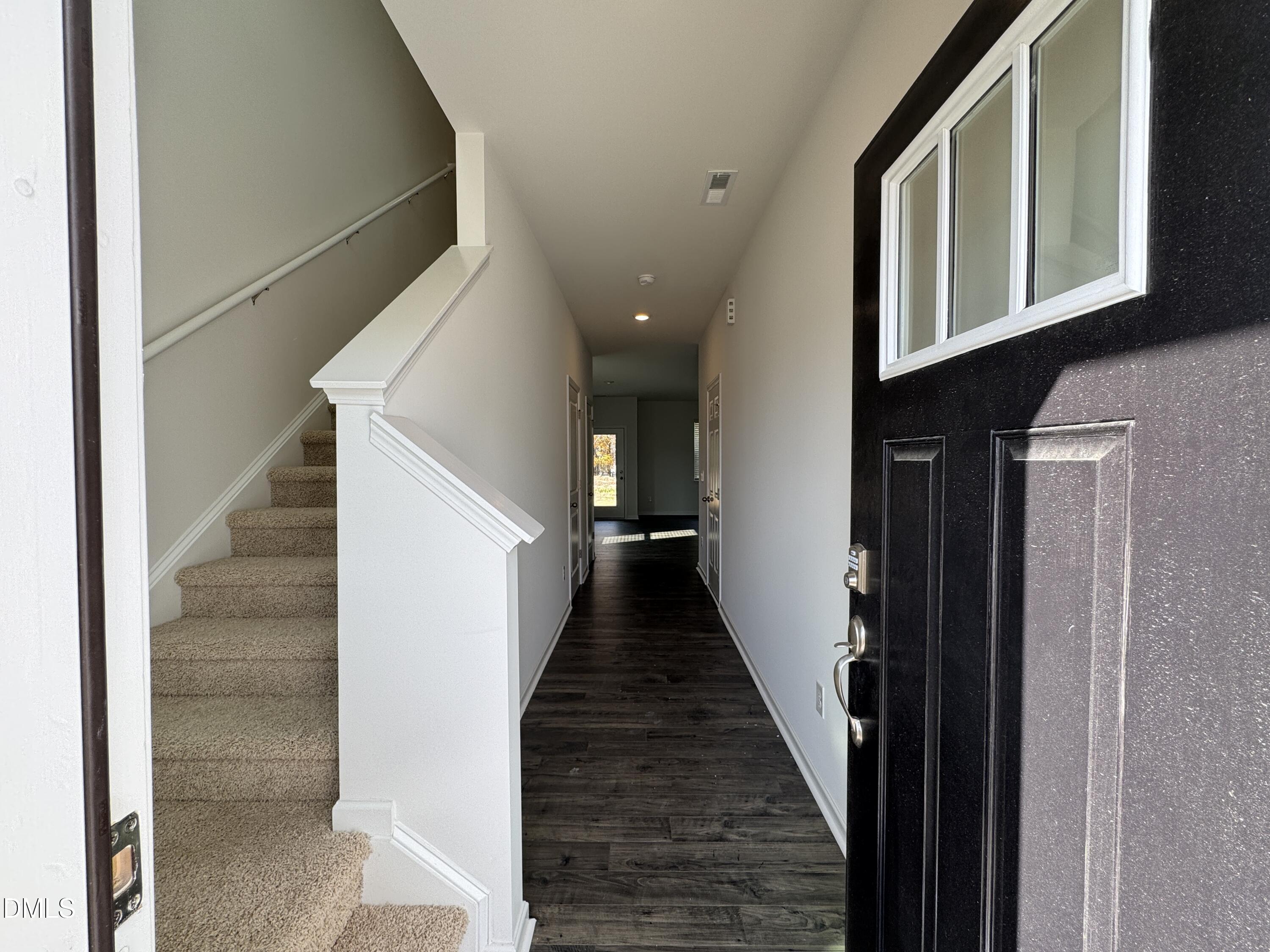 413 Belgian Red Way Wake Forest, NC 27587 - Photo 3 of 19 a view of entryway and hall with wooden floor