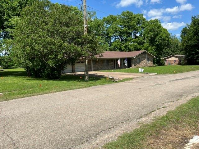 304 Sunset Street Roxton, TX 75477 - Photo 26 of 31 a house with a outdoor space