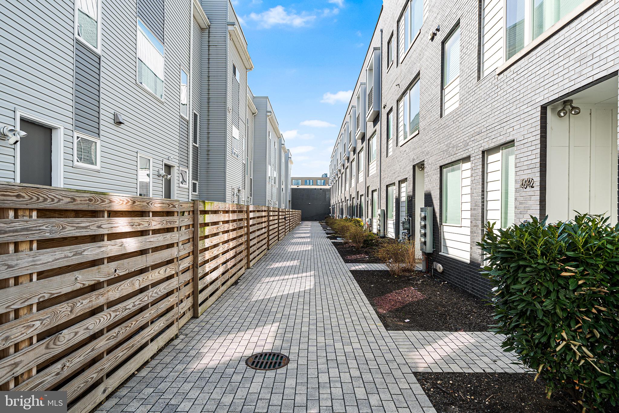 1640 North 5th Court, Unit 29A Philadelphia, PA 19122 - Photo 14 of 21 a view of a pathway along a building