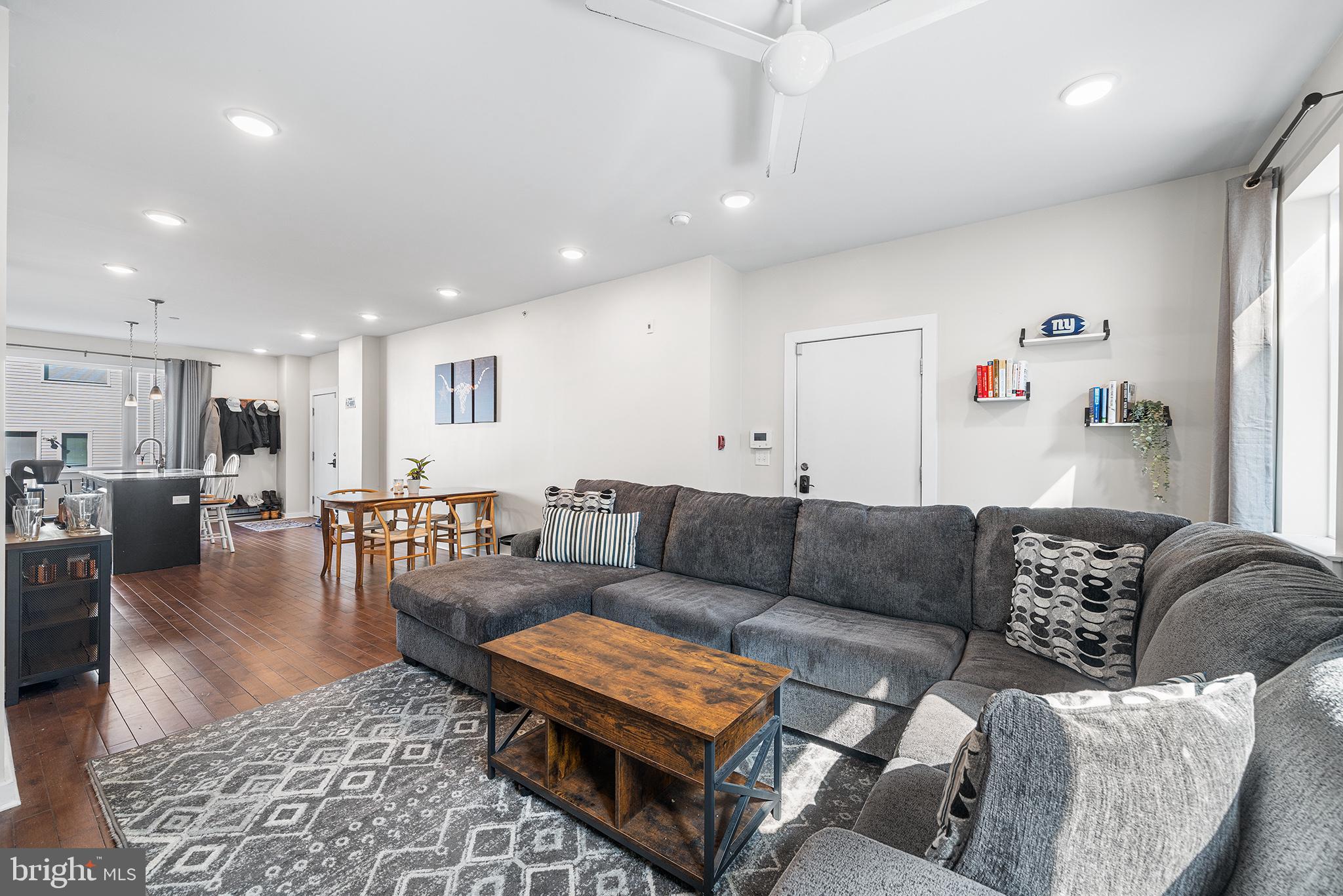 1640 North 5th Court, Unit 29A Philadelphia, PA 19122 - Photo 6 of 21 a living room with furniture and wooden floor