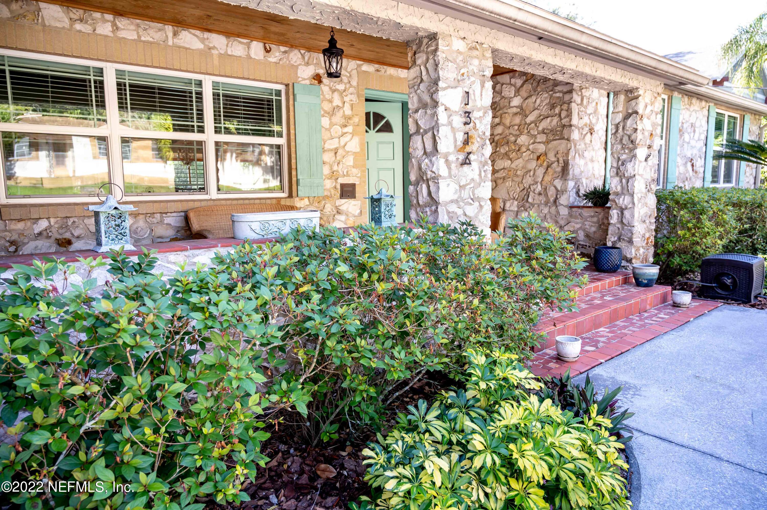 1316 Mayfair Road Jacksonville, FL 32207 - Photo 3 of 47 front view of a house with a potted plant