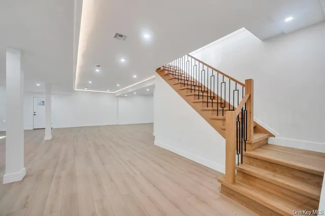 a view of a hallway with staircase
