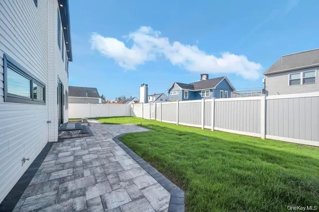 a view of a backyard with a garden