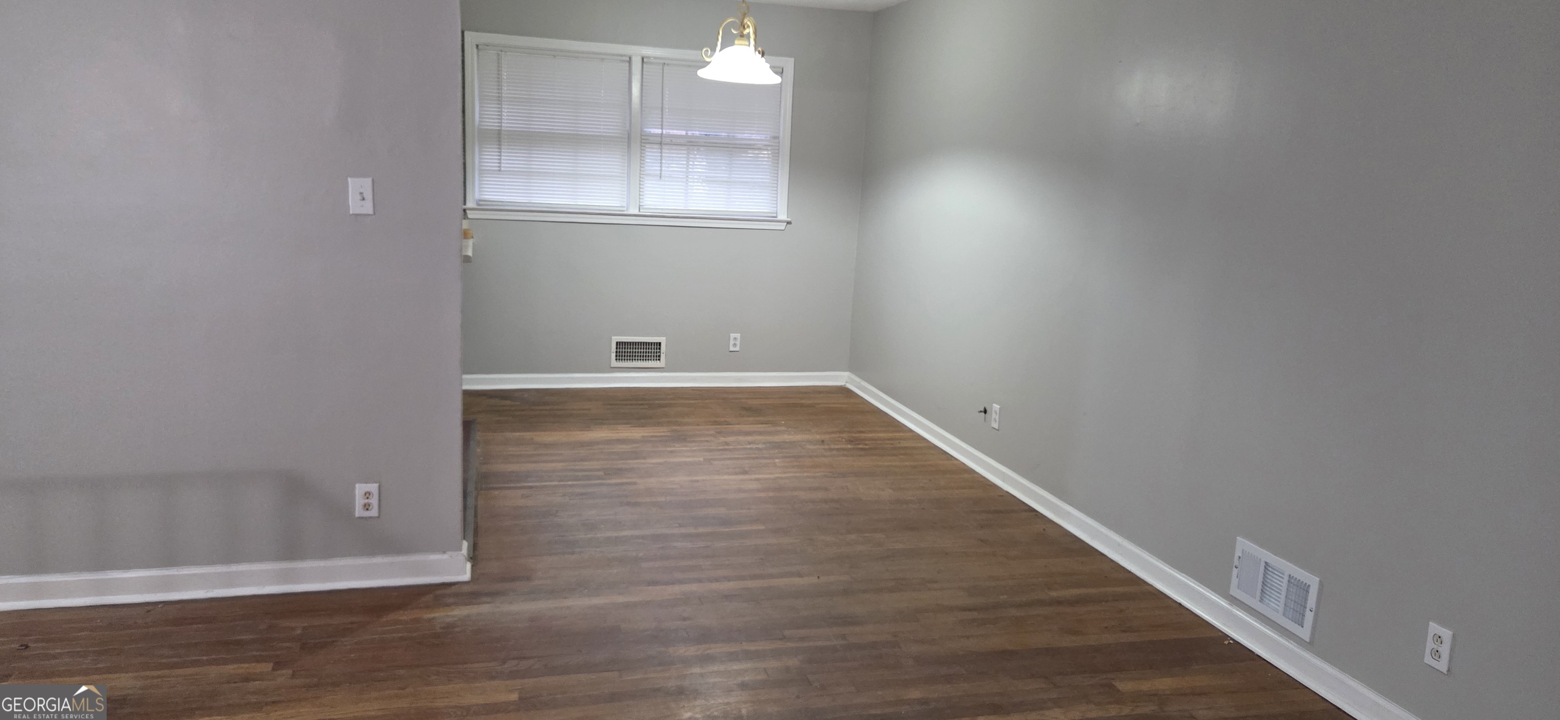 449 Charter Oak Drive Southwest Atlanta, GA 30331 - Photo 3 of 15 Dining room opens to the kitchen for easy conversations and food service.