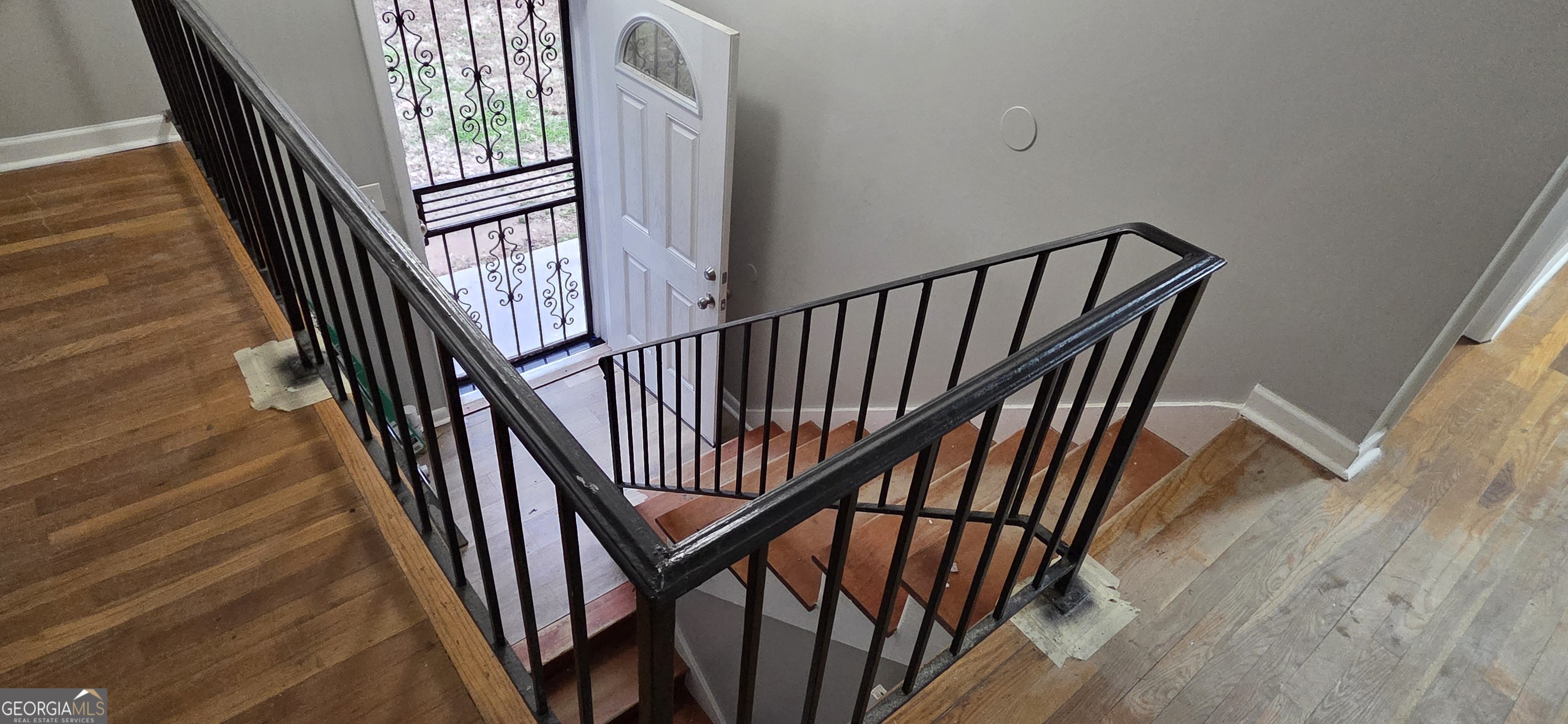 449 Charter Oak Drive Southwest Atlanta, GA 30331 - Photo 5 of 15 This split foyer design has wood floors and stylish iron railings