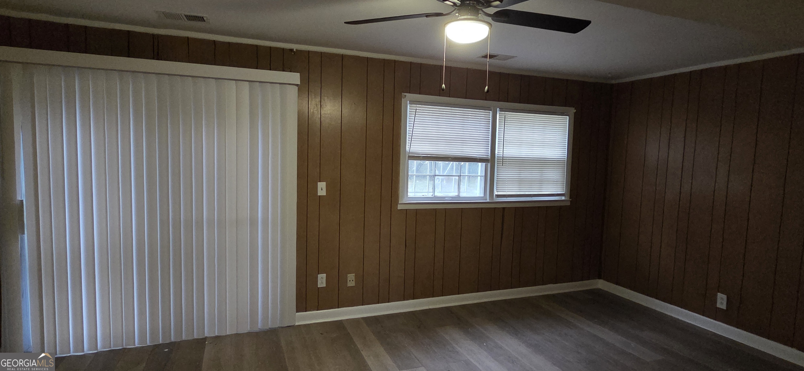 449 Charter Oak Drive Southwest Atlanta, GA 30331 - Photo 8 of 15 The basement family room
