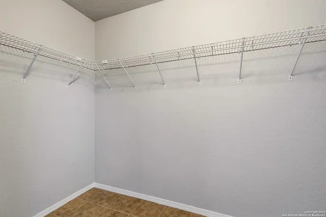 a view of a room with racks on the wall