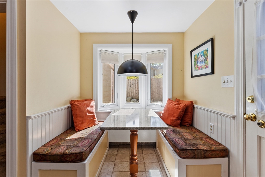 58 Hutchinson Road Arlington, MA 02474 - Photo 18 of 40 a living room with furniture and a rug