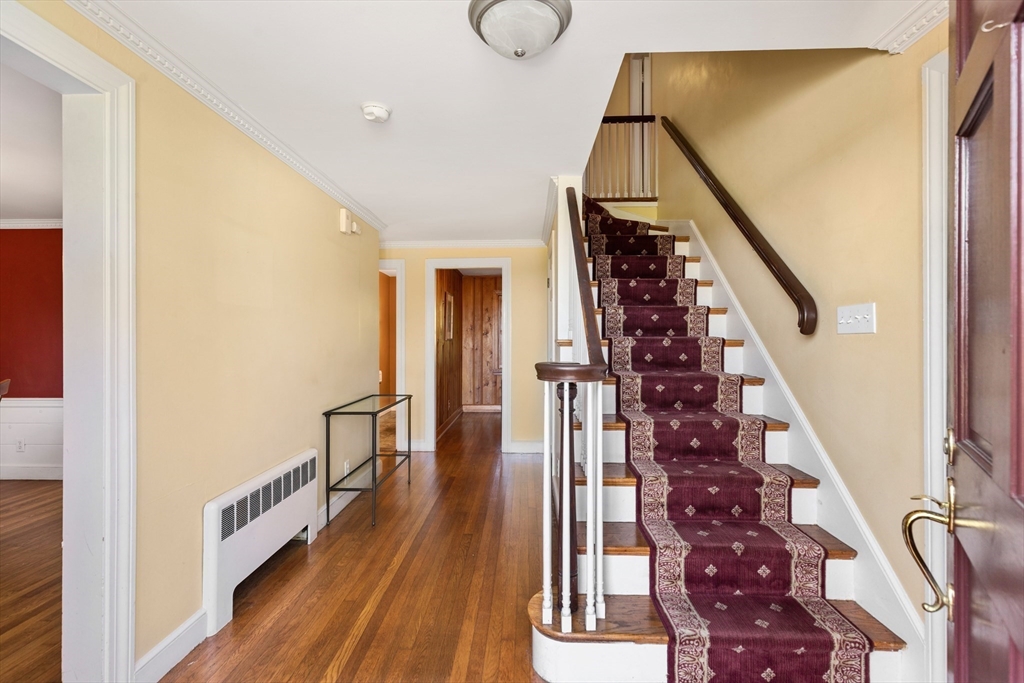 58 Hutchinson Road Arlington, MA 02474 - Photo 20 of 40 a view of entryway with wooden floor