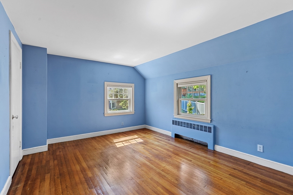 58 Hutchinson Road Arlington, MA 02474 - Photo 28 of 40 a view of an empty room with a window