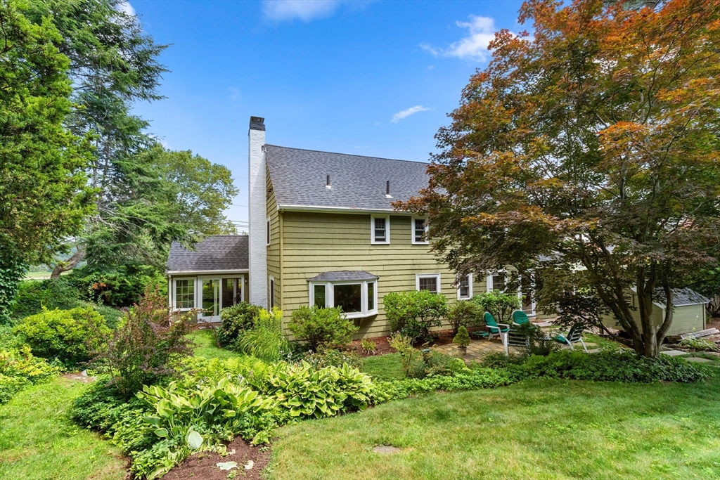 58 Hutchinson Road Arlington, MA 02474 - Photo 38 of 40 a front view of a house with a yard